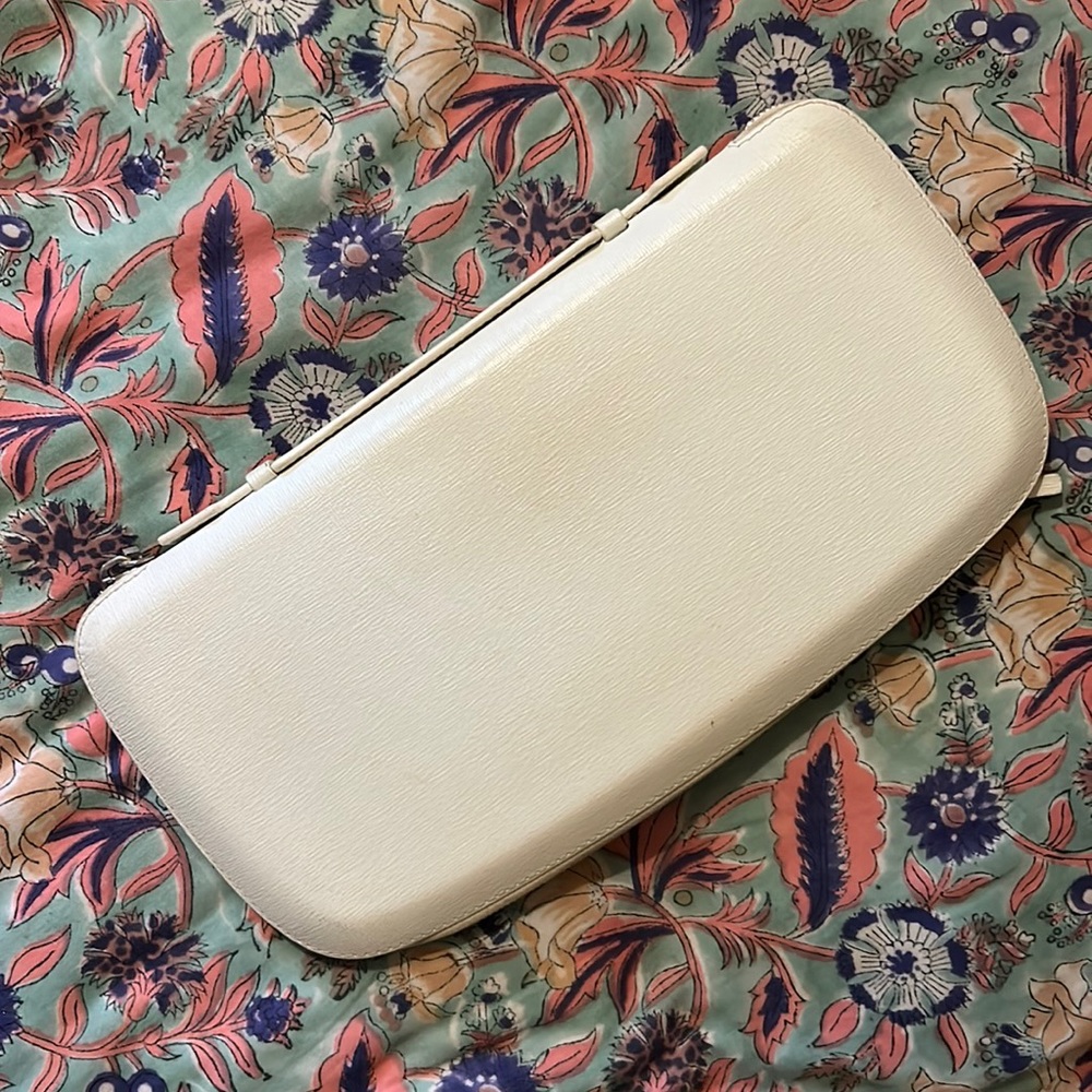 Beautiful PERRIN statement peace wallet/clutch. Excellent condition.